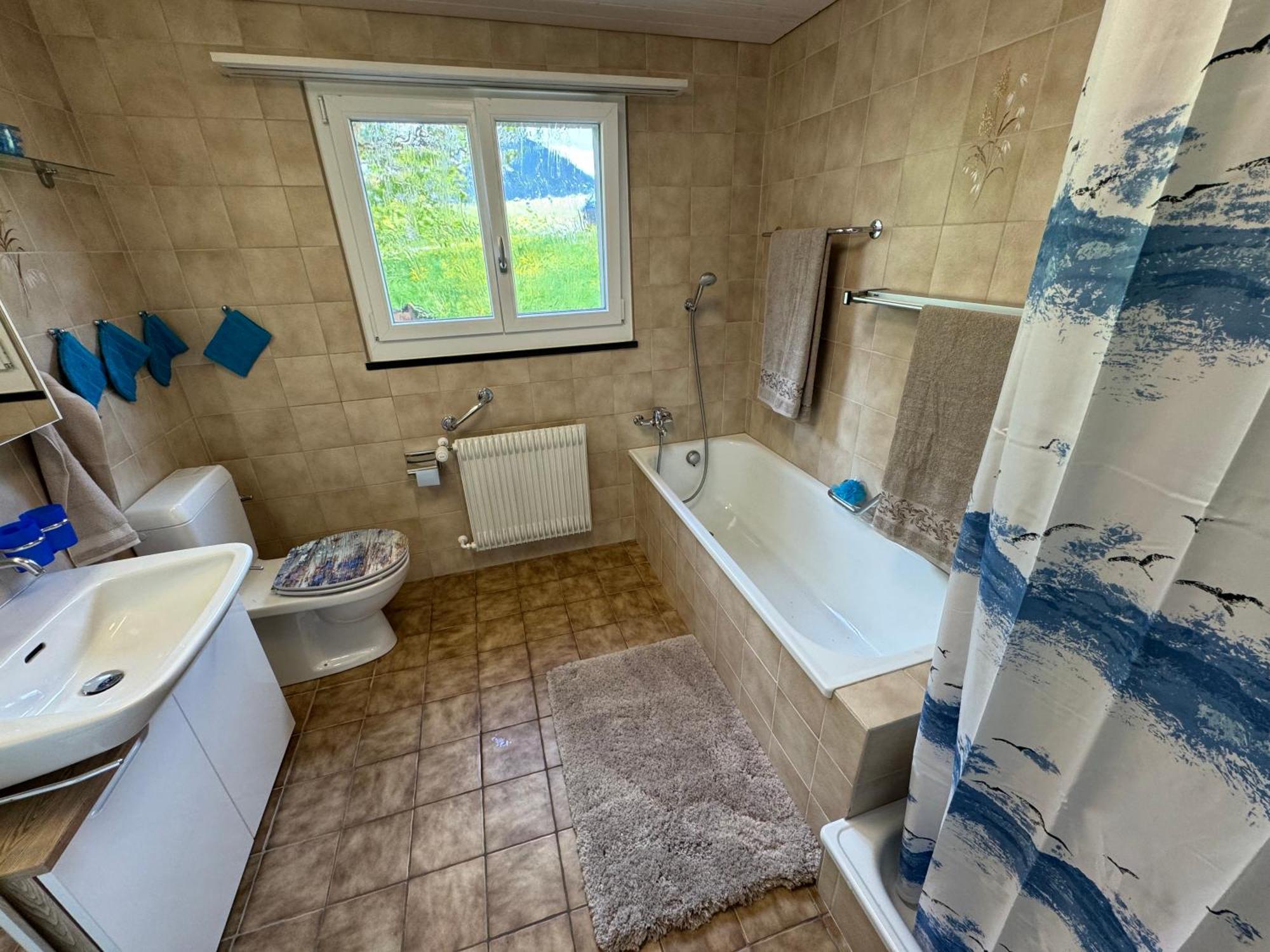 See Und Berge Family Faulensee Exterior foto